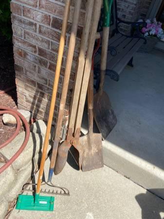 Rake, post hole digger, shovels and dry wall sander.jpg