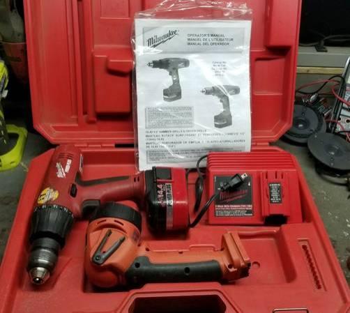 Milwaukee 14.4v hammer drill + battery + charger + case - TESTED.jpg